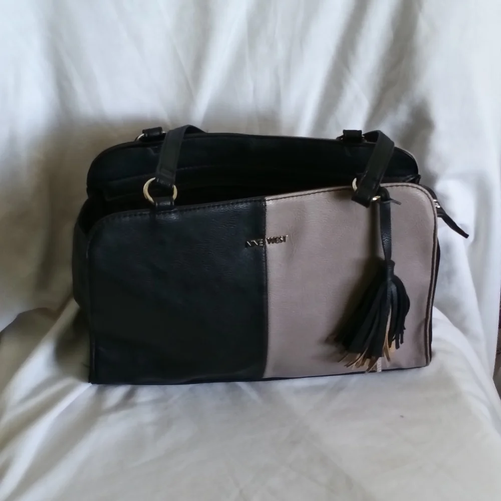 Nine West Purse Black and Cream Satchel Bag Pocket Book Elegant Versatile Tassel